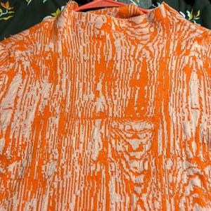 This darlings sweater type short sleeve blouse from Anthropologie